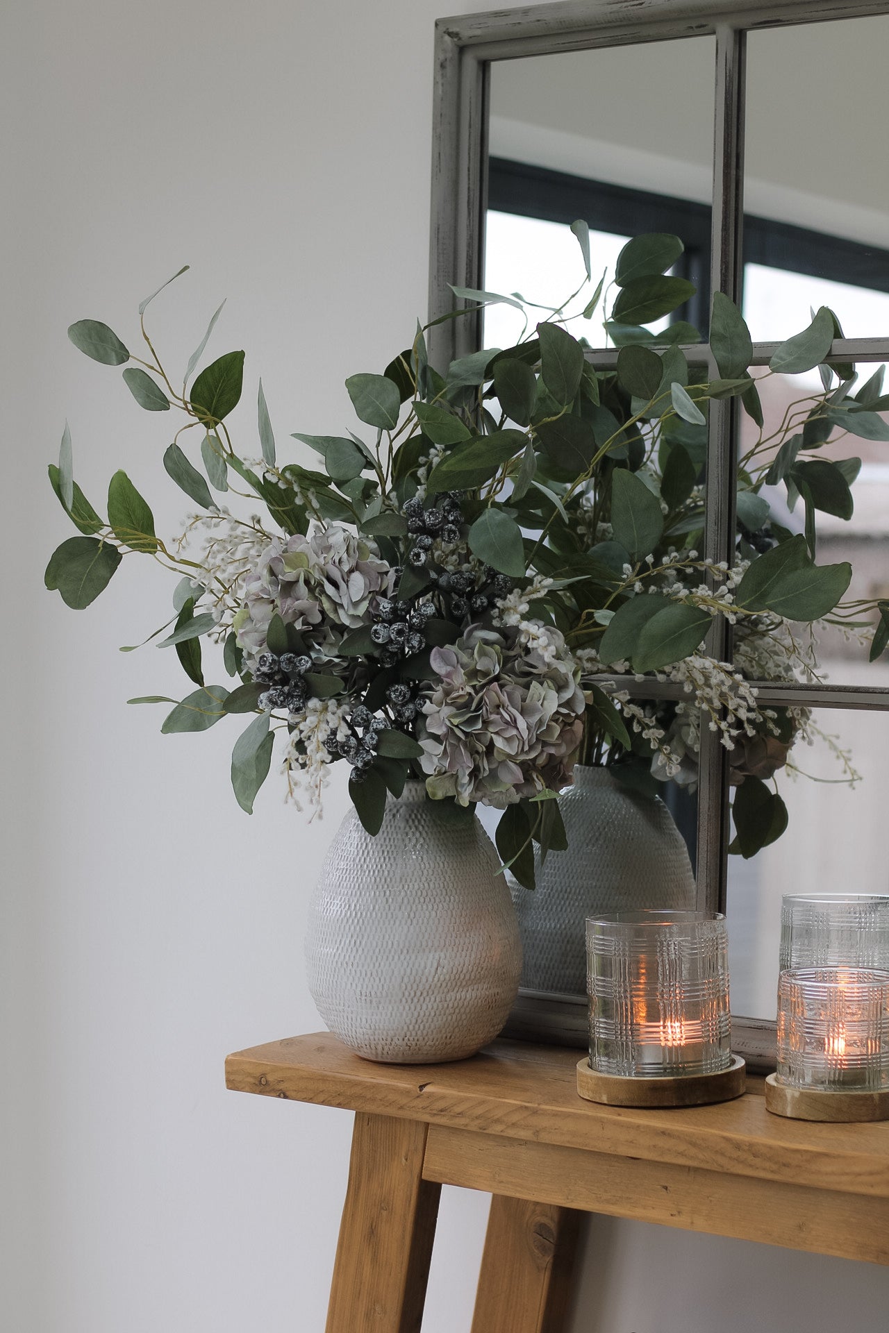 Faux winter hydrangea and white willow floral arrangement. Luxury Christmas faux floral arrangement, perfect for styling on your kitchen island or dining table to create a real statement this Christmas time. Introduce faux flowers to your Christmas decor.