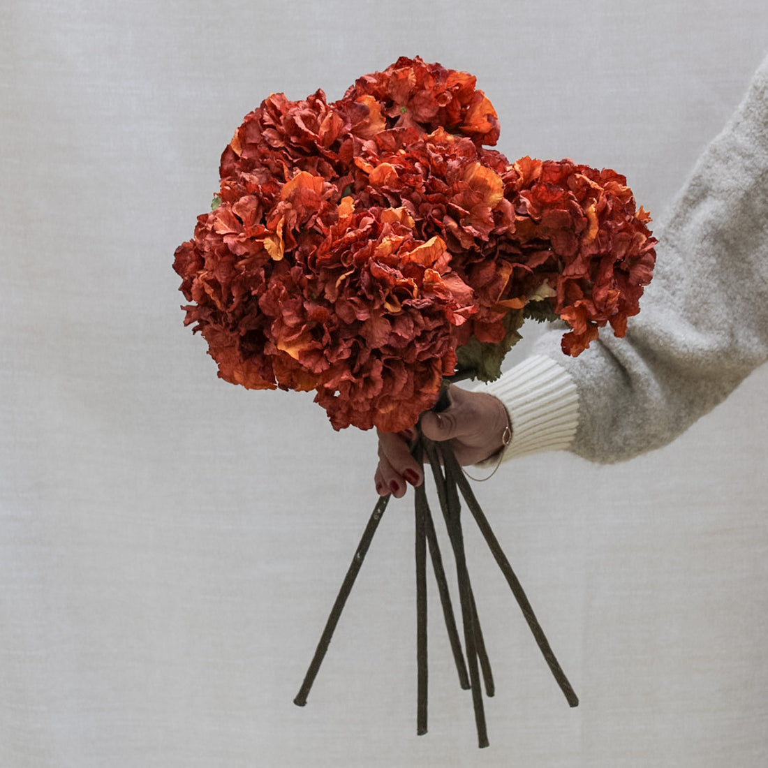 bundle of faux deep orange hydrangeas