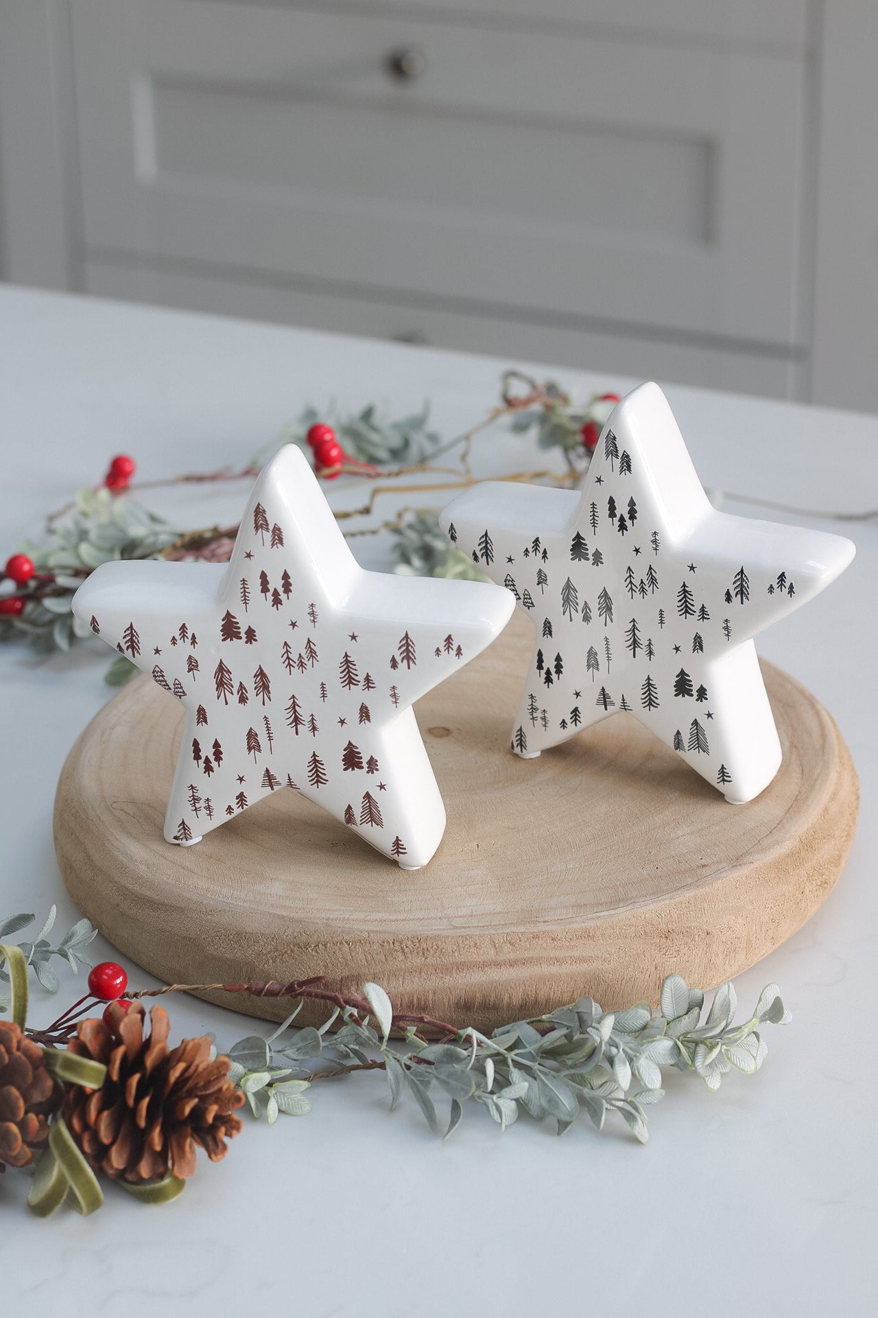 White Ceramic Stars with Brown and Black Trees