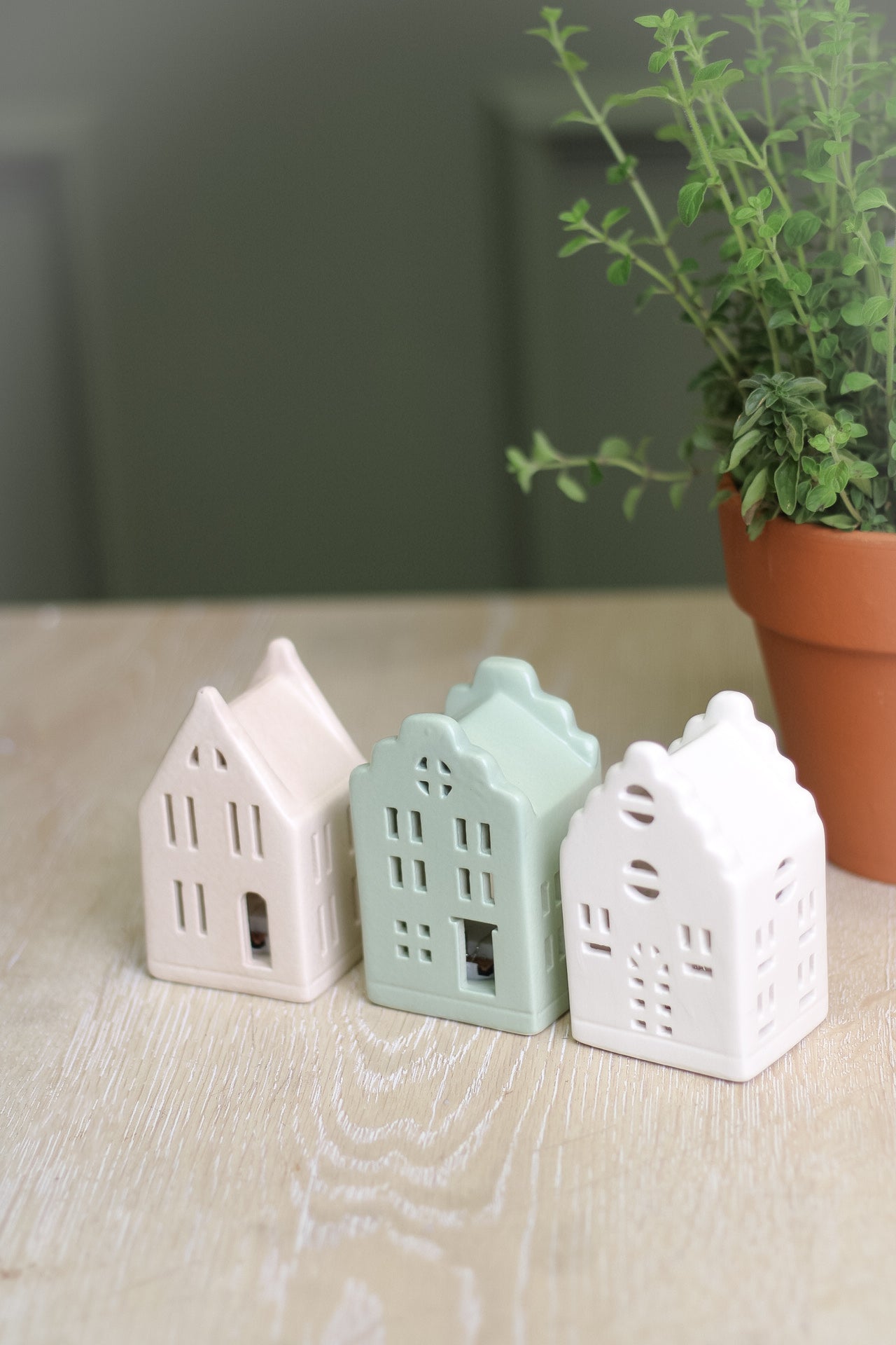 set of three ceramic houses