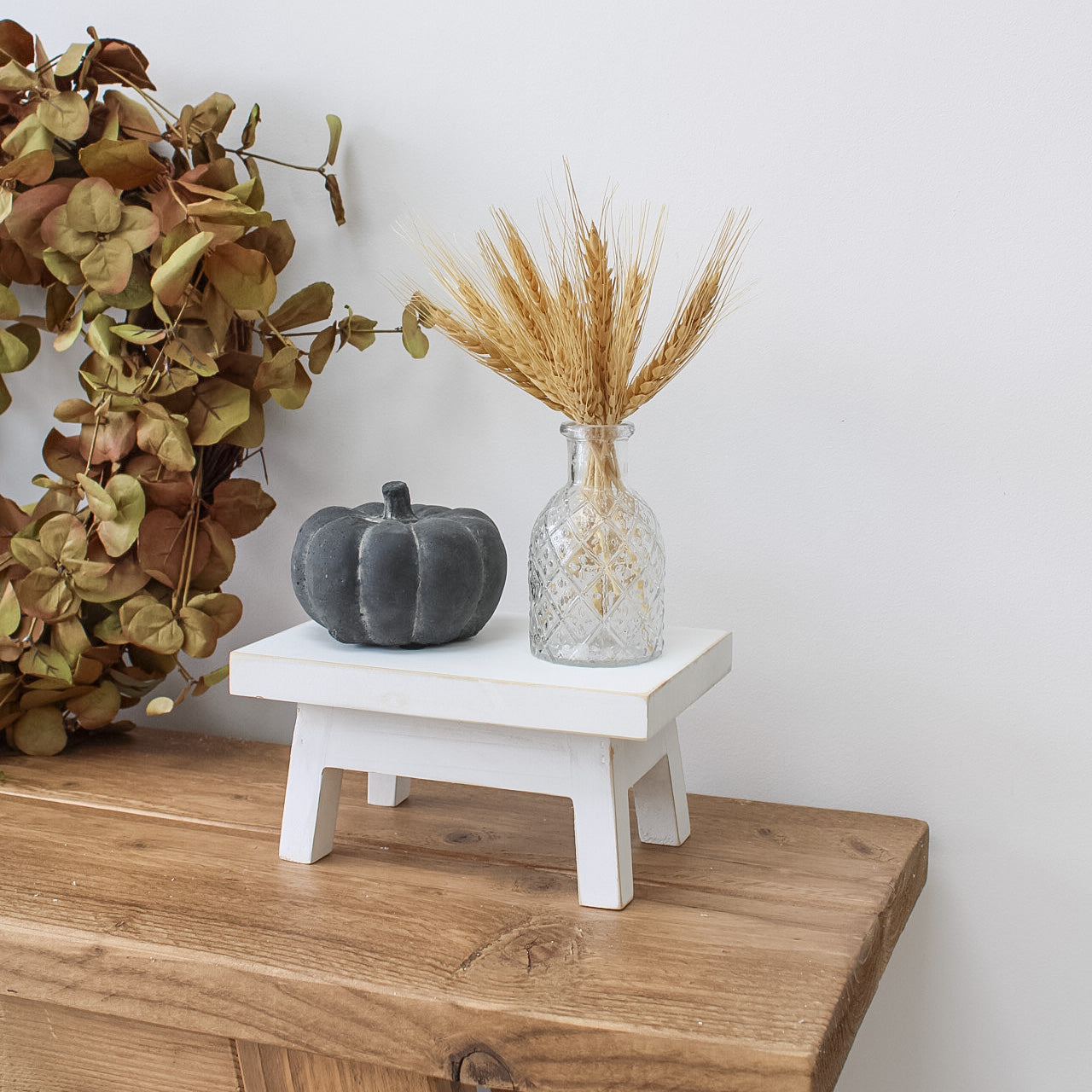 white bench on console table