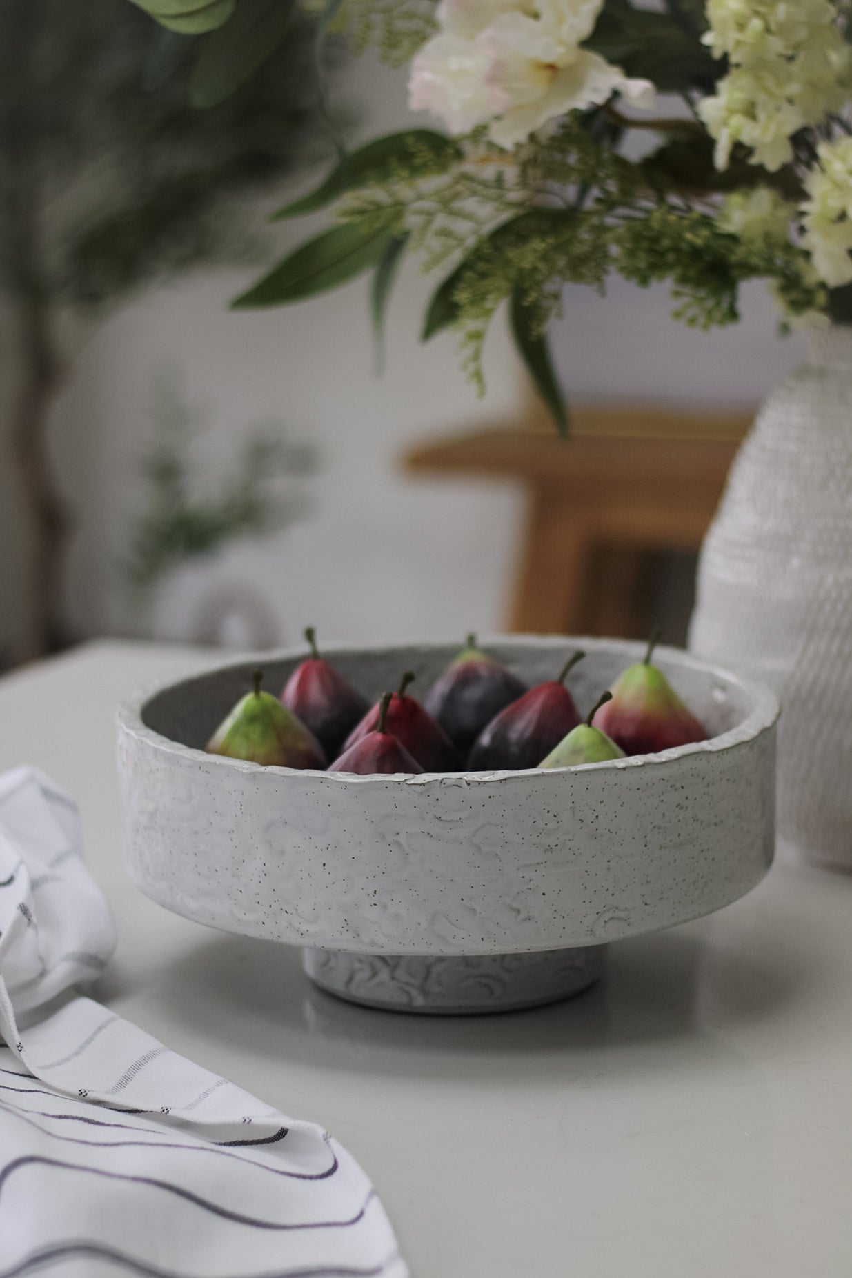 faux figs in decorative bowl for home decor