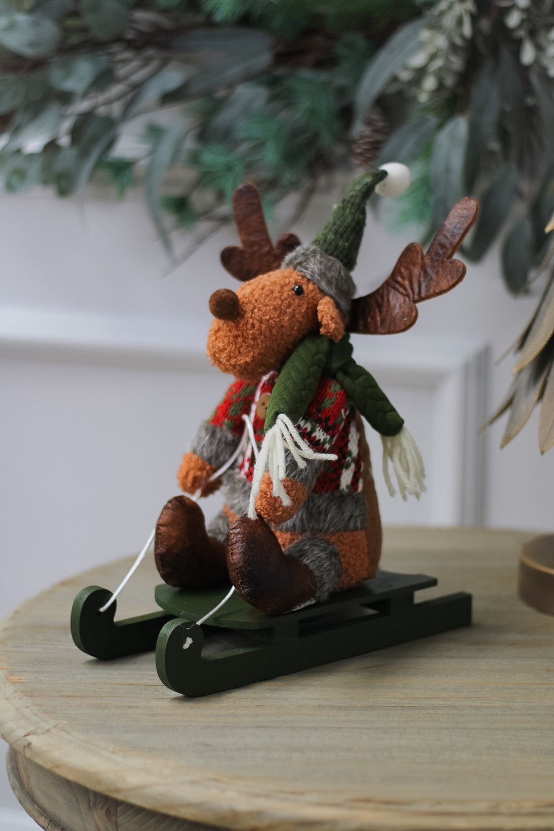 Dasher Reindeer on Green Wooden Sleigh