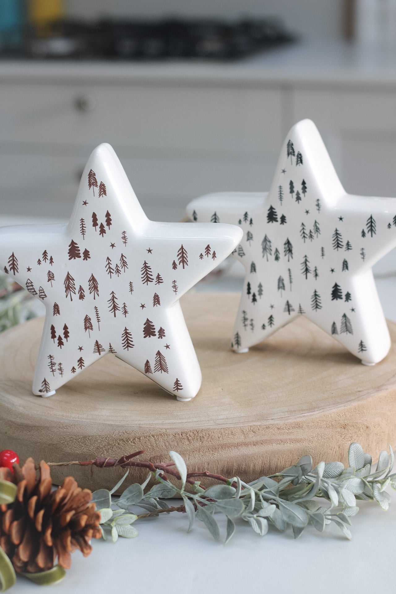 White Ceramic Stars with Brown and Black Trees