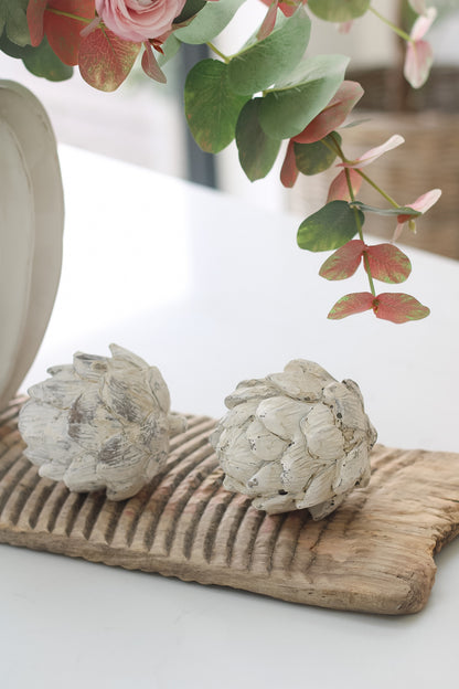 Decorative Stone Artichokes on vintage wooden washboard