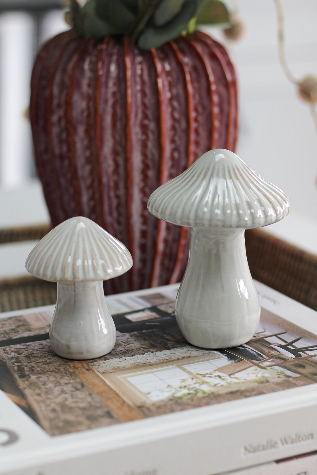 close up of set of glazed ceramic mushrooms