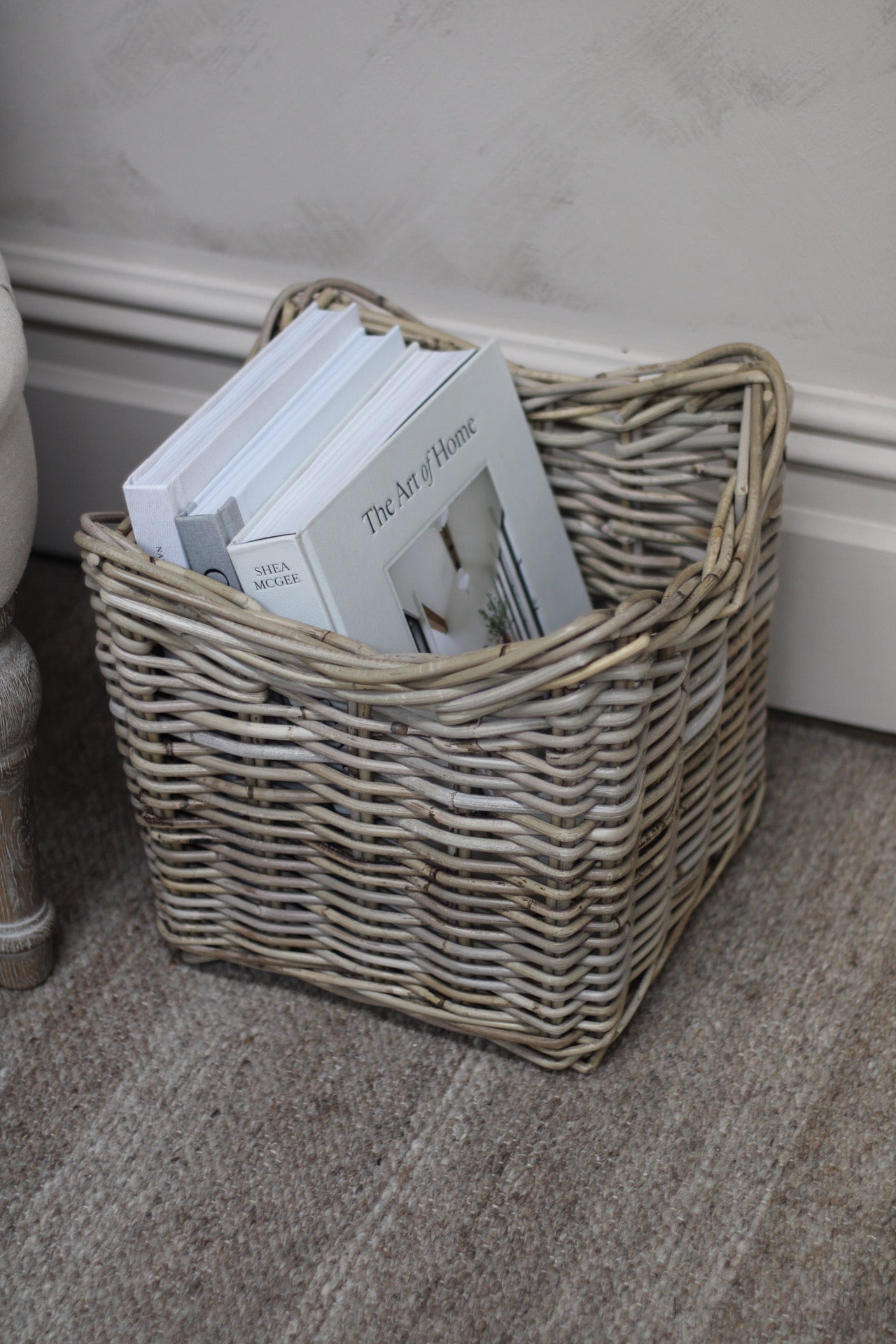 rattan basket filled with books