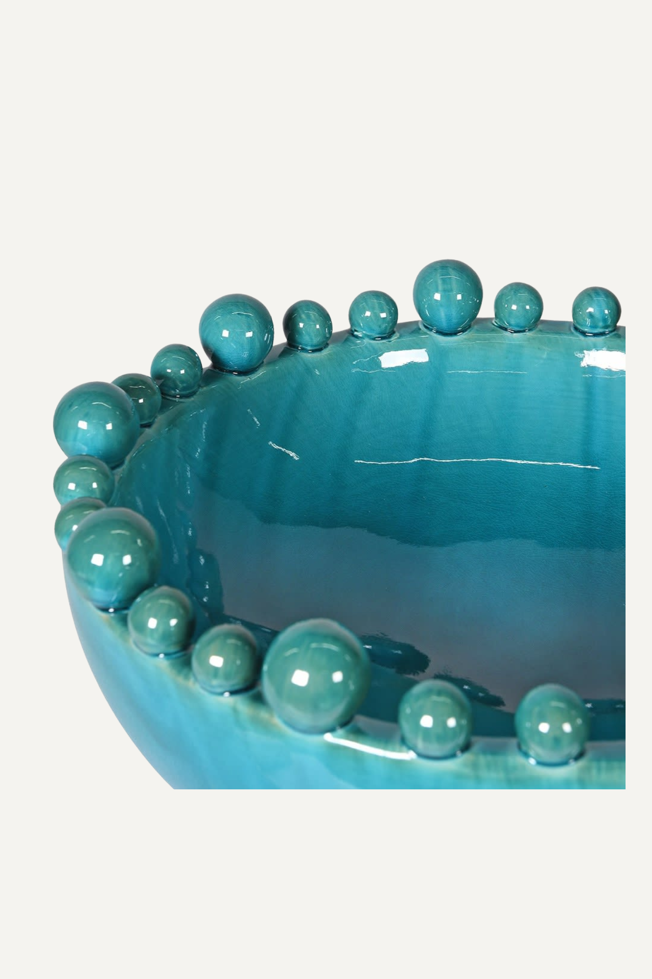 up close of aqua ceramic bobble bowl