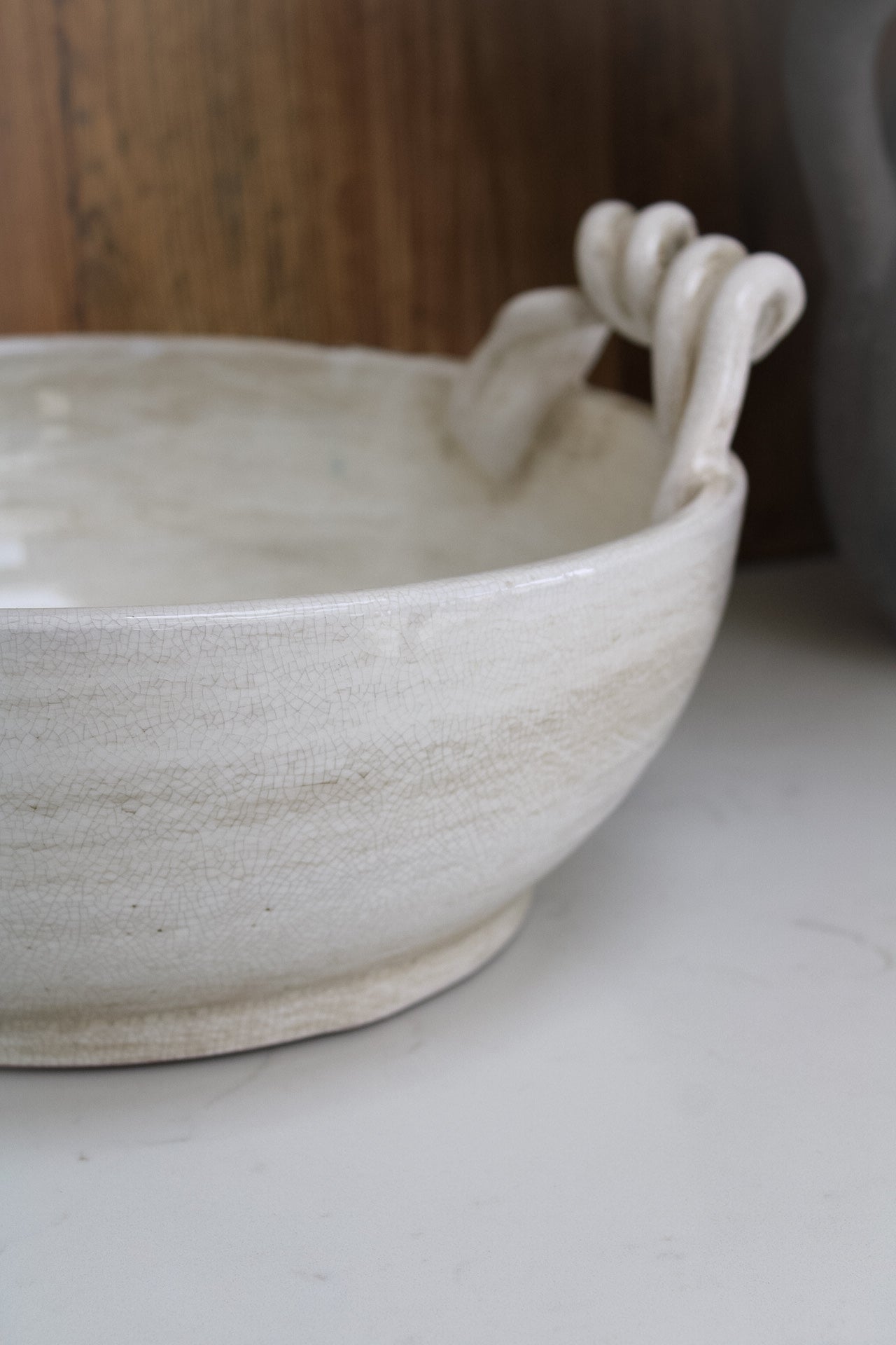 Ceramic fruit bowl with twisted handles with crackle glazed finish, perfect for the farmhouse look