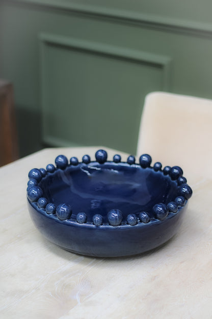 dark blue round bobble edged bowl