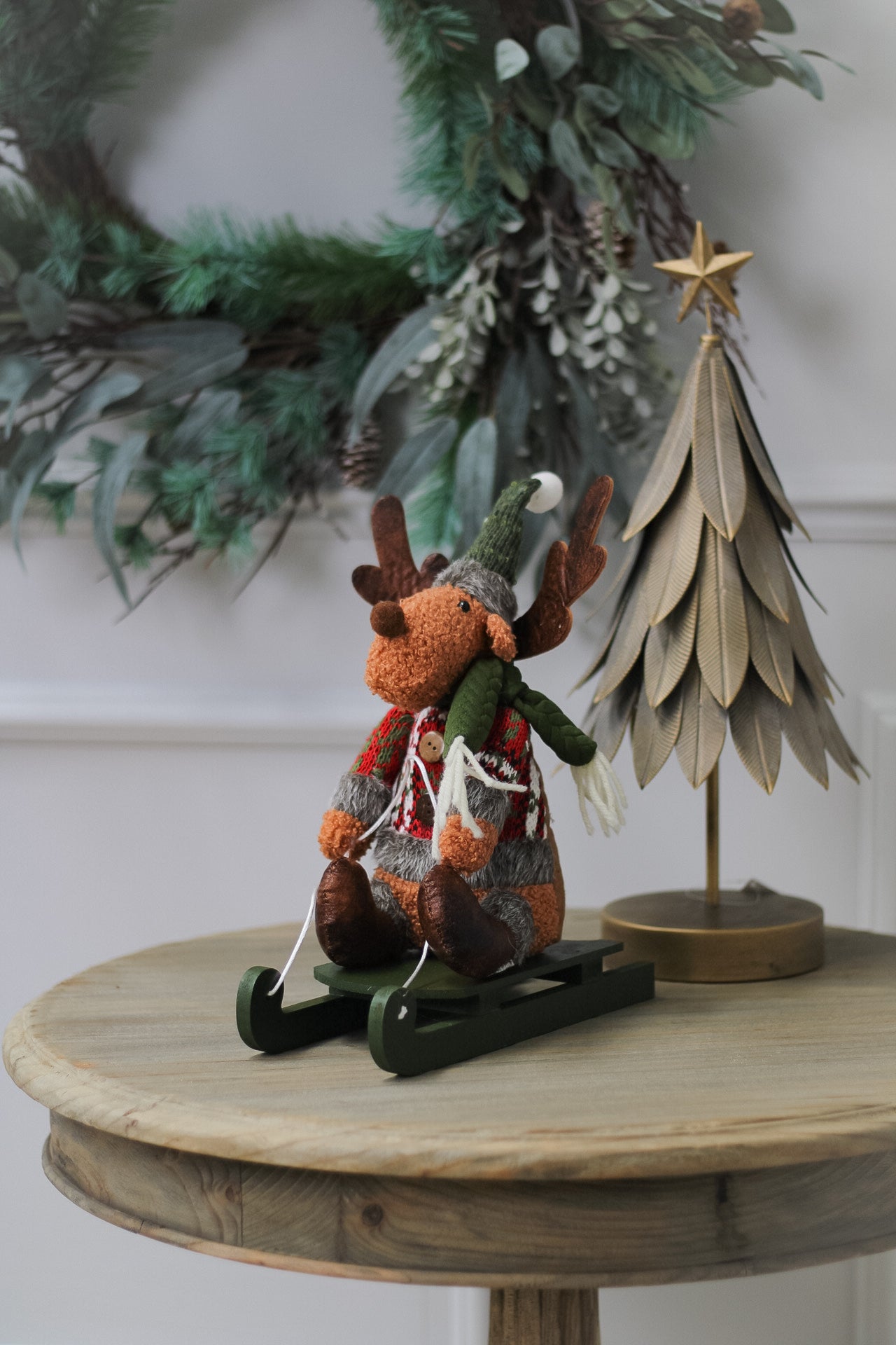 Dasher Reindeer on Green Wooden Sleigh