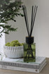 Florist Sences Reed Diffuser, styled on side table with rustic bowl for home decor