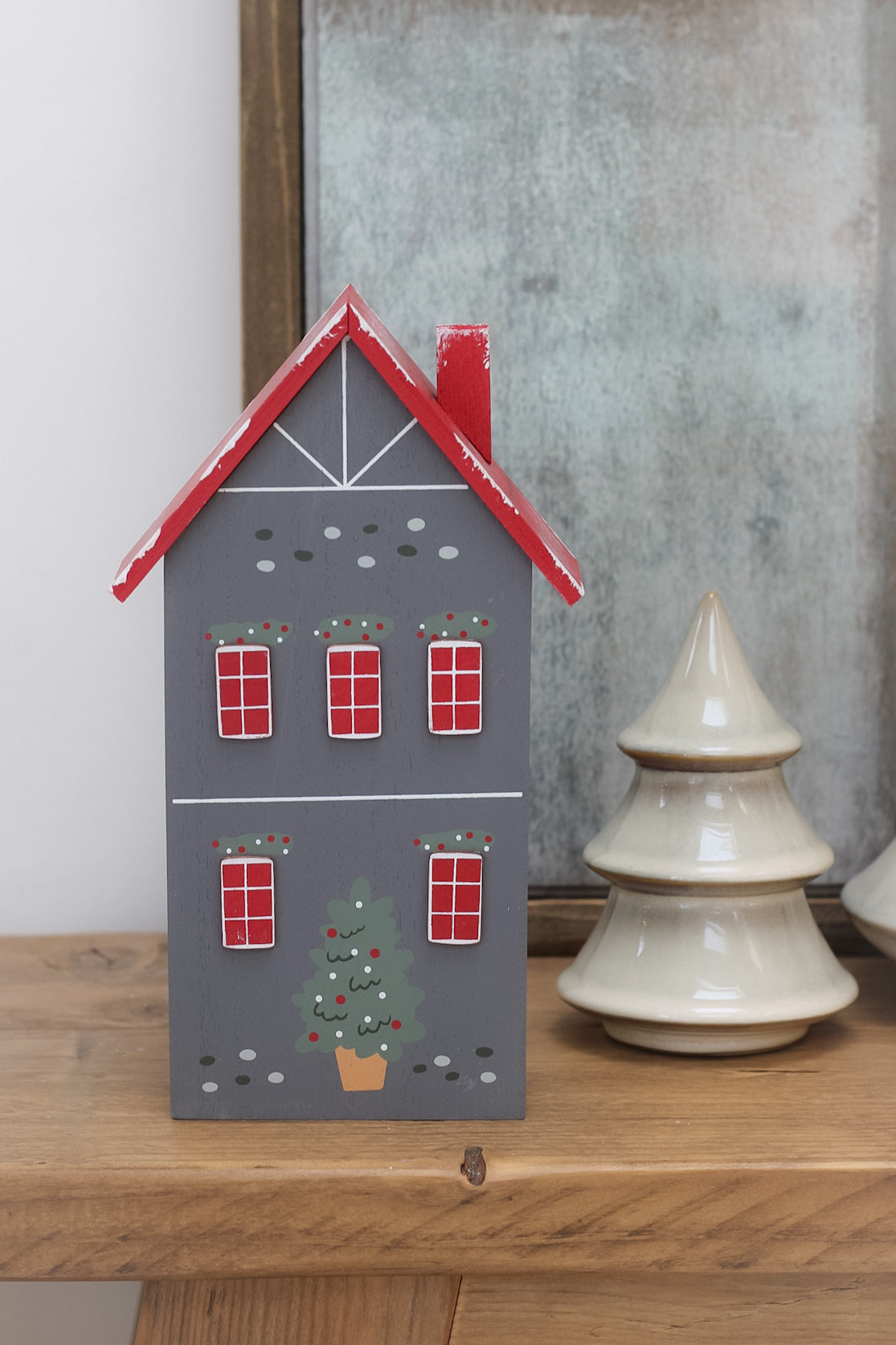 tall dark grey wooden christmas with elegant christmas tree, perfect for shelf styling