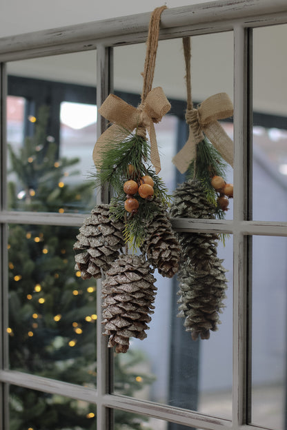 Hanging Pinecones and Faux Foliage with Hessian Bow