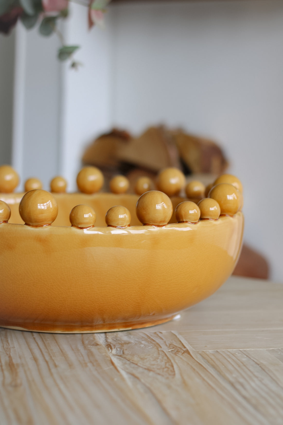 Up close of mustard ceramic bobble bowl