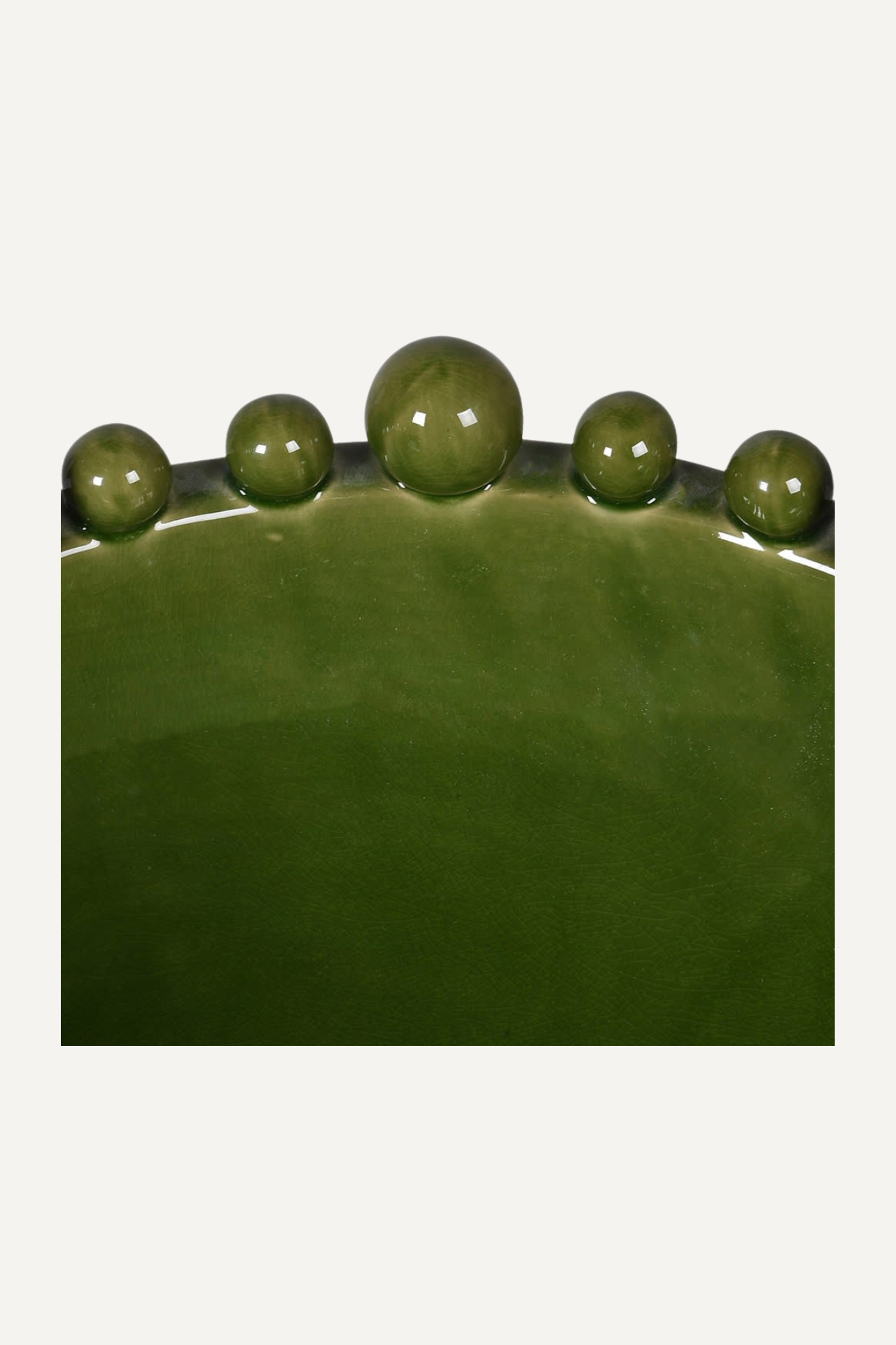 Up close green ceramic bobble bowl