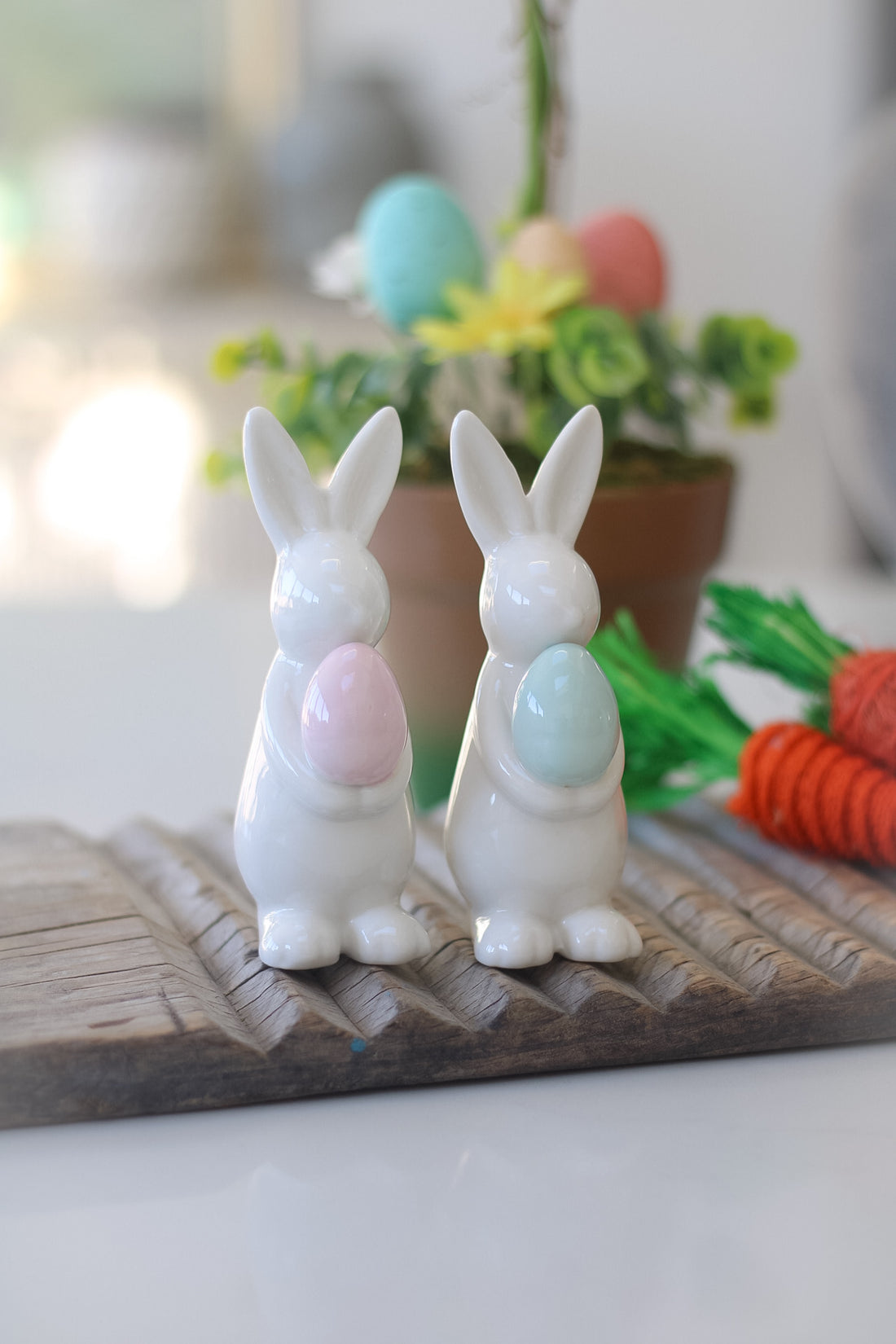 White Ceramic Bunnies with Pastel Eggs