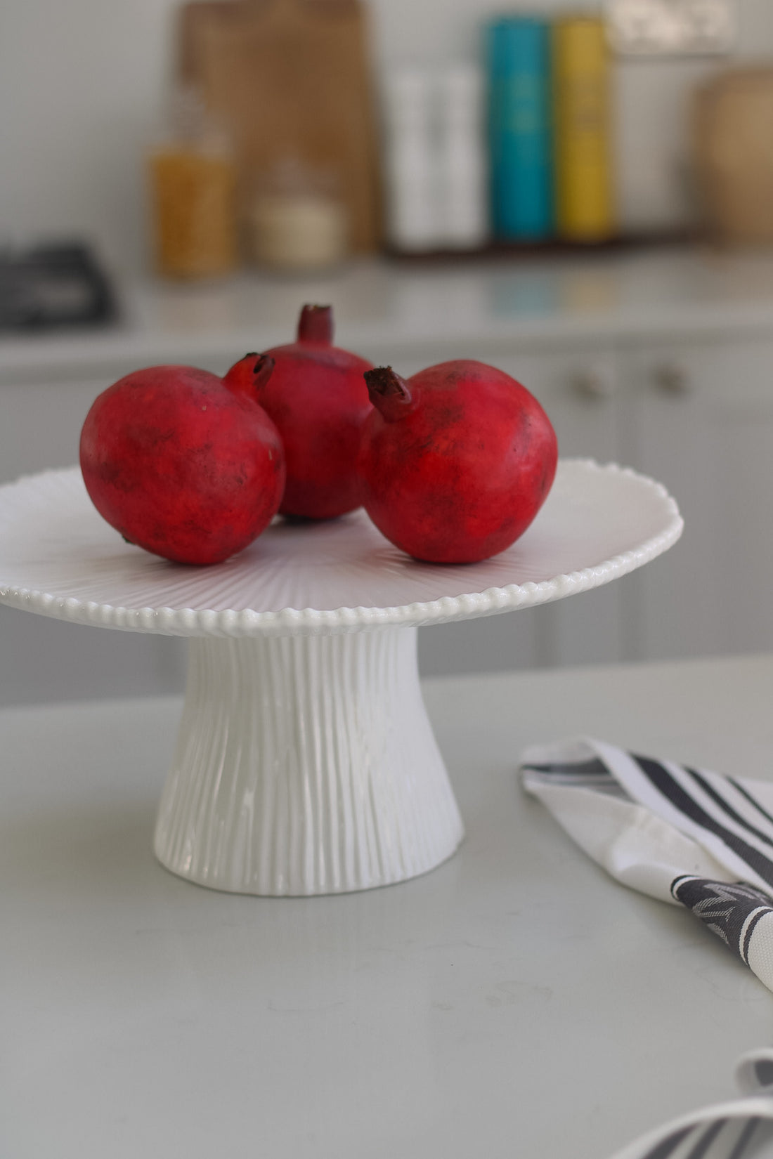 ridged white ceramic cake stand