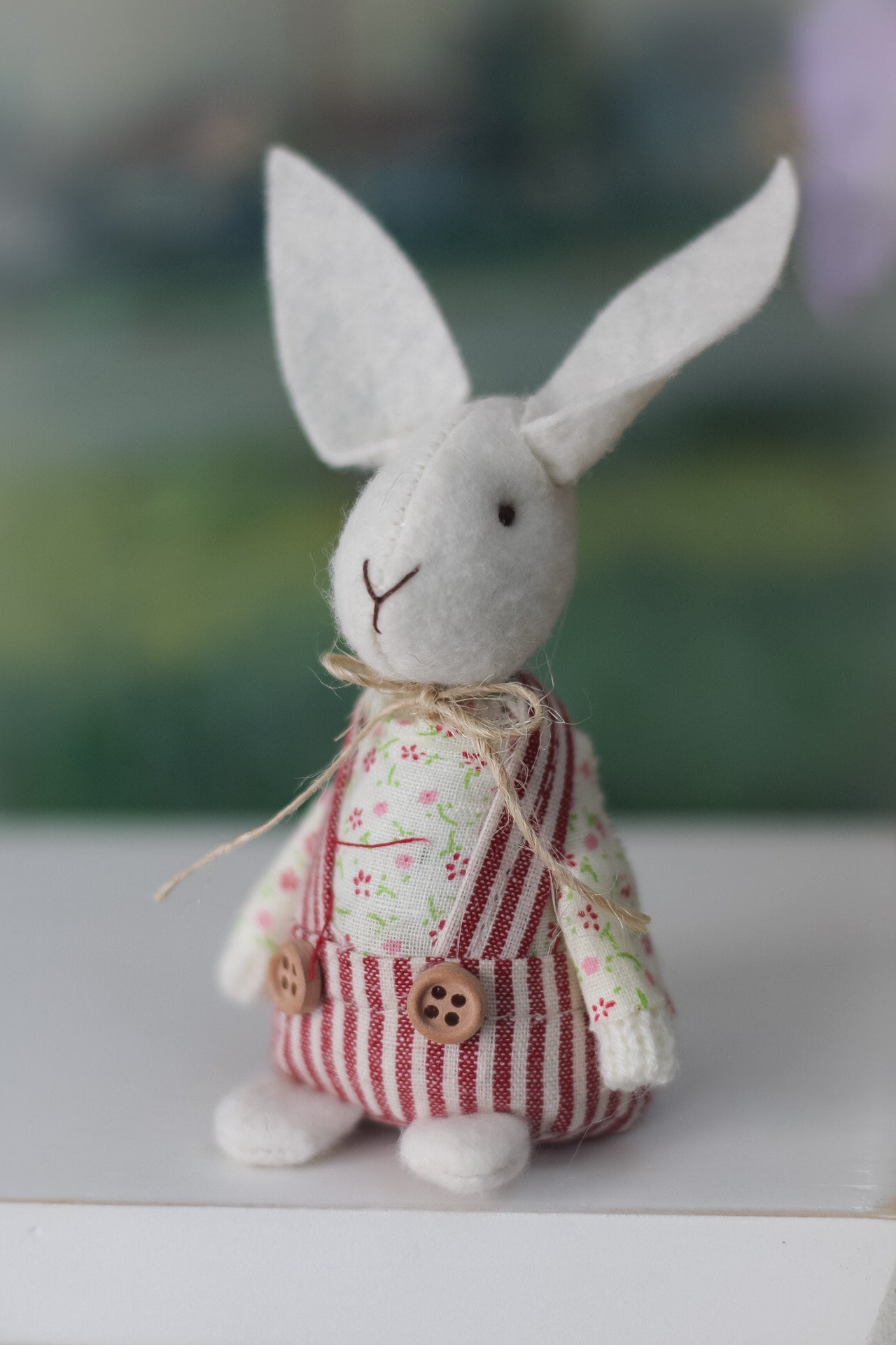 decorative easter bunny with tall ears in striped red and white dunagrees