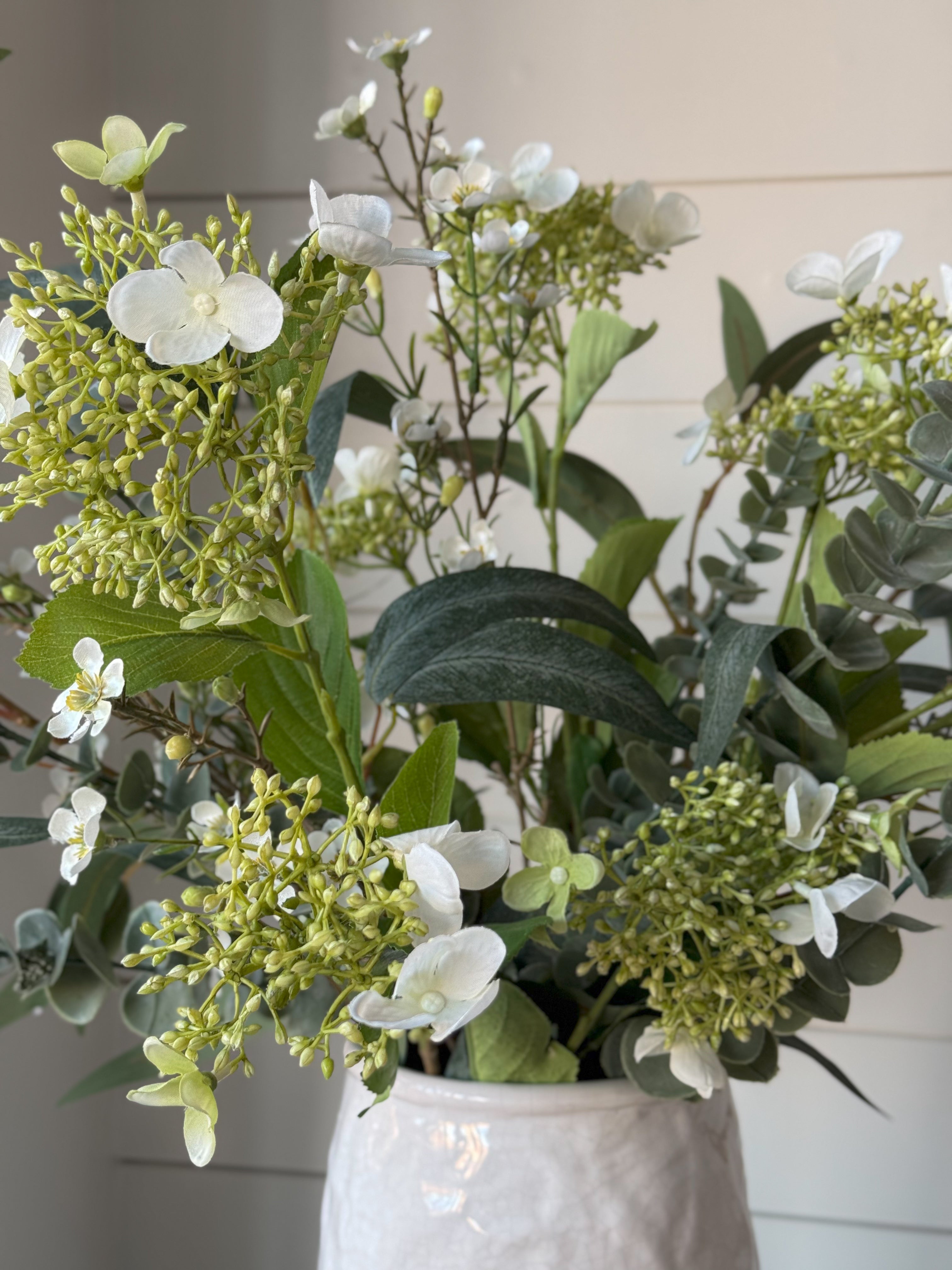 faux spring foliage arrangement