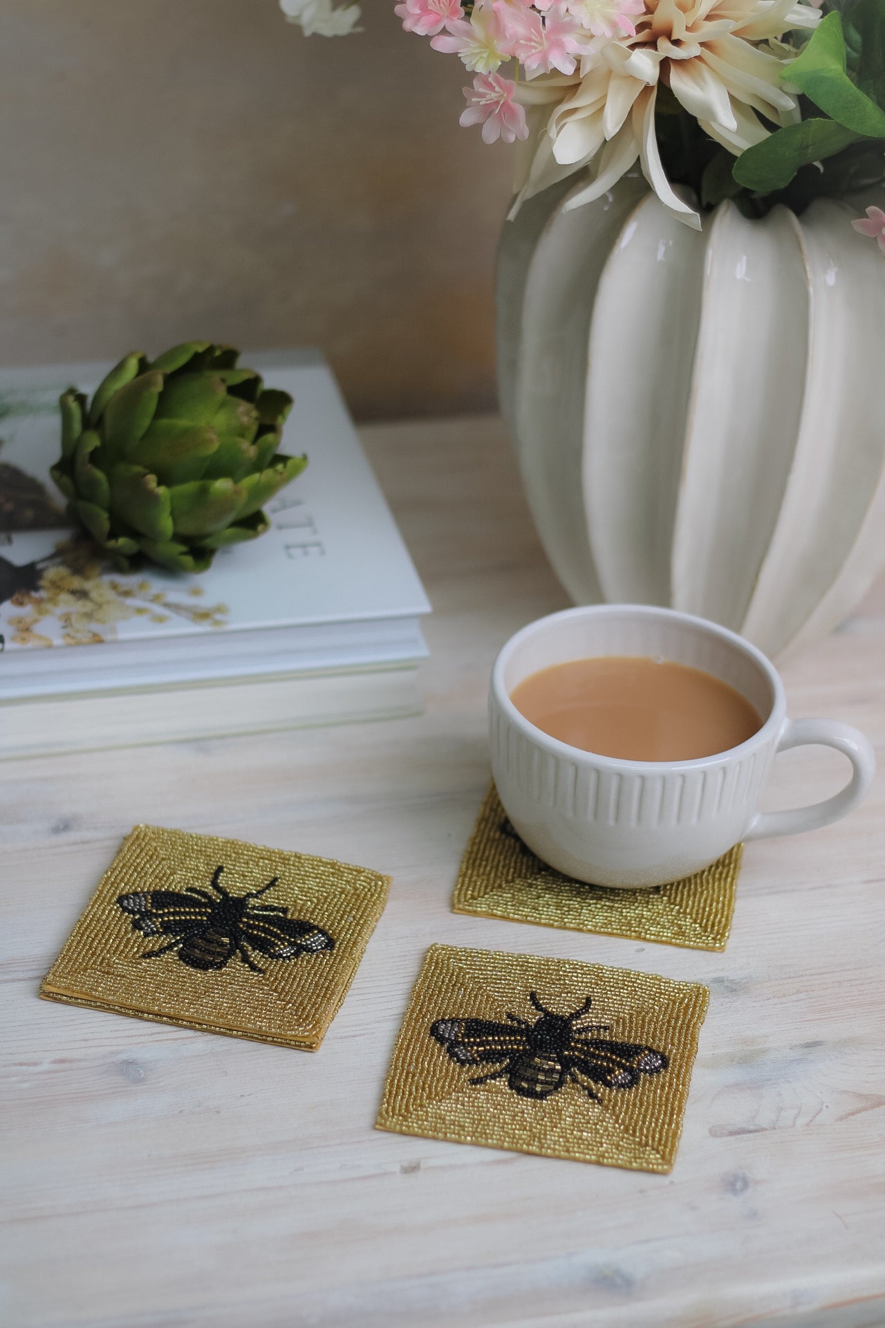 gold beaded bee coasters