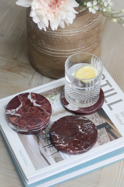 round burgundy marble coasters