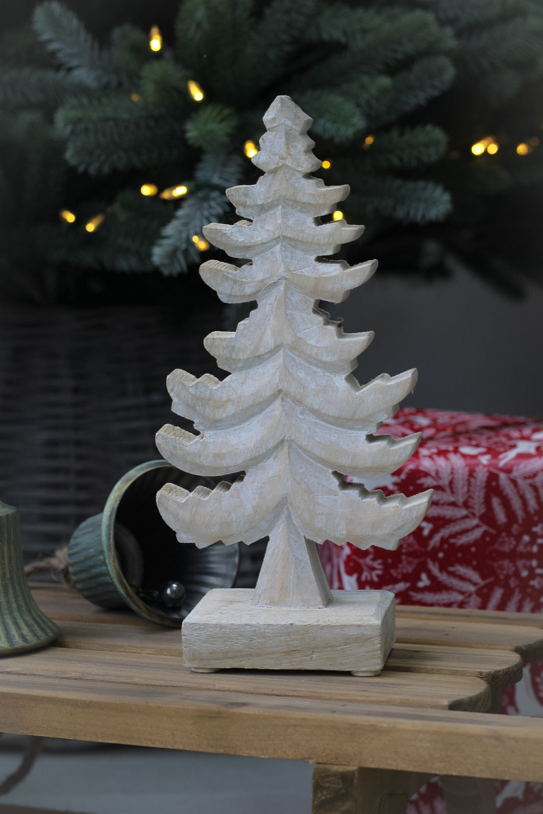 White washed wooden festive tree for christmas decor styling